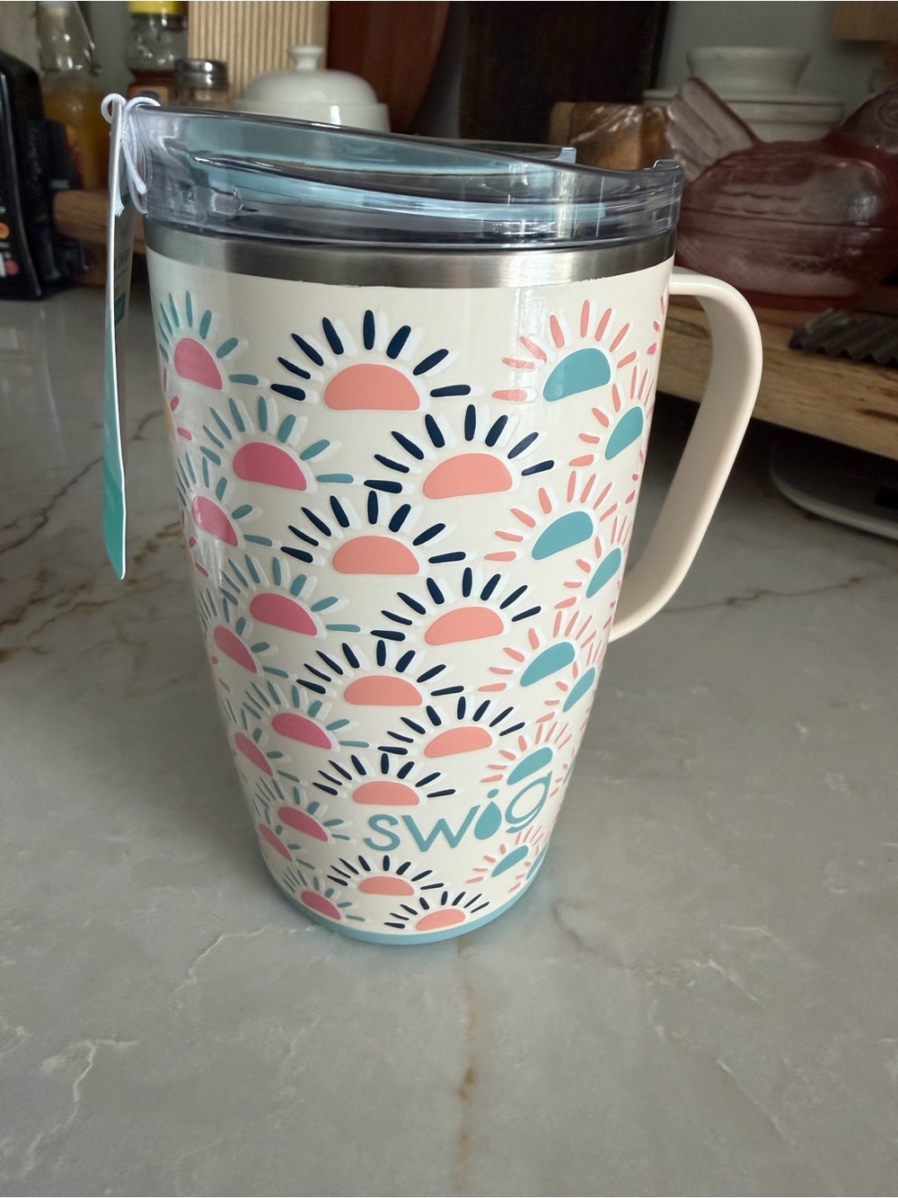Swig Insulated Stainless Steel Travel Mug with Pink and Teal Sunburst Pattern